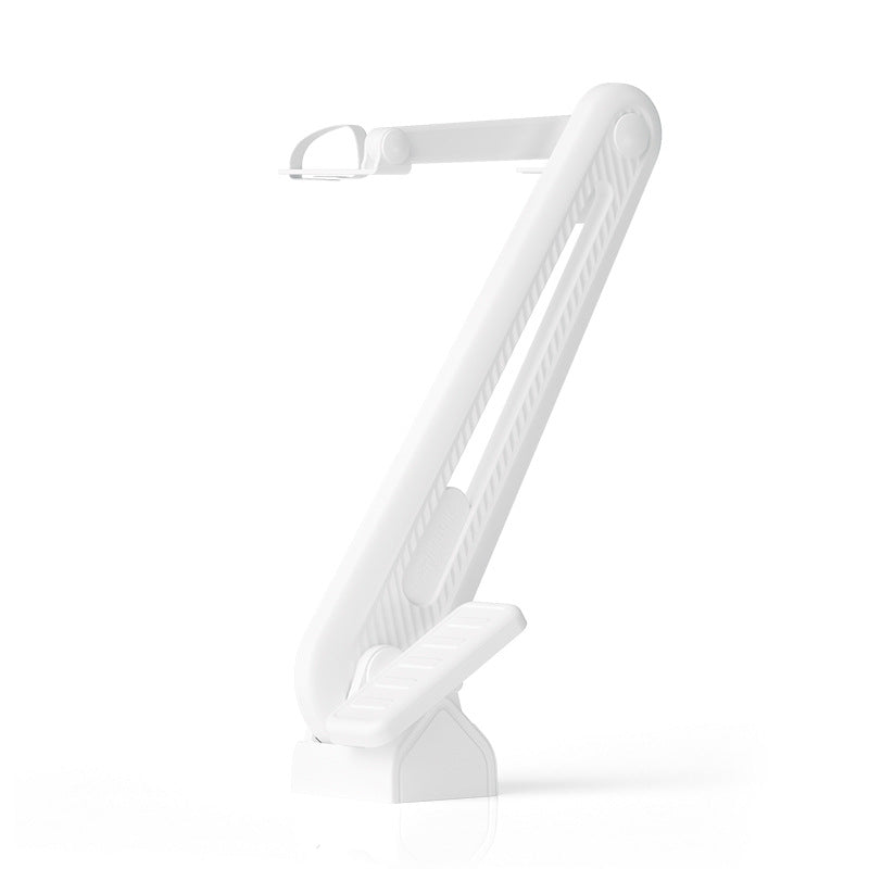 0120 Foot operated toilet seat opener
